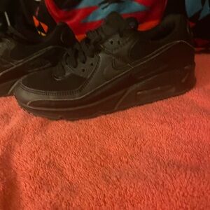 Nike All-Black Athletic Shoes